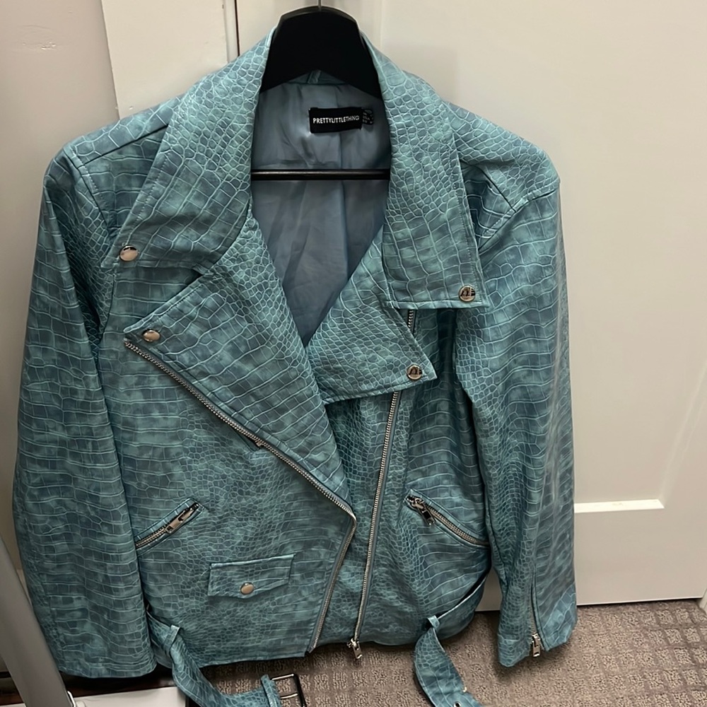 PLT ladies Blue leather jacket only worn once and dry cleaned size 8.